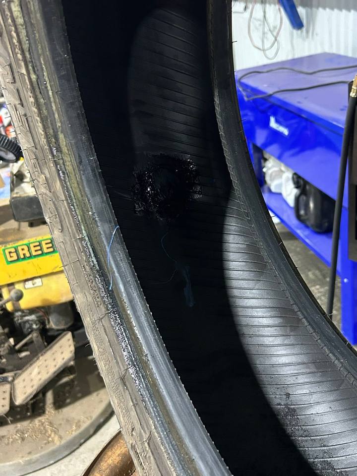 Inside of the tyre showing the internal patch repair over the puncture